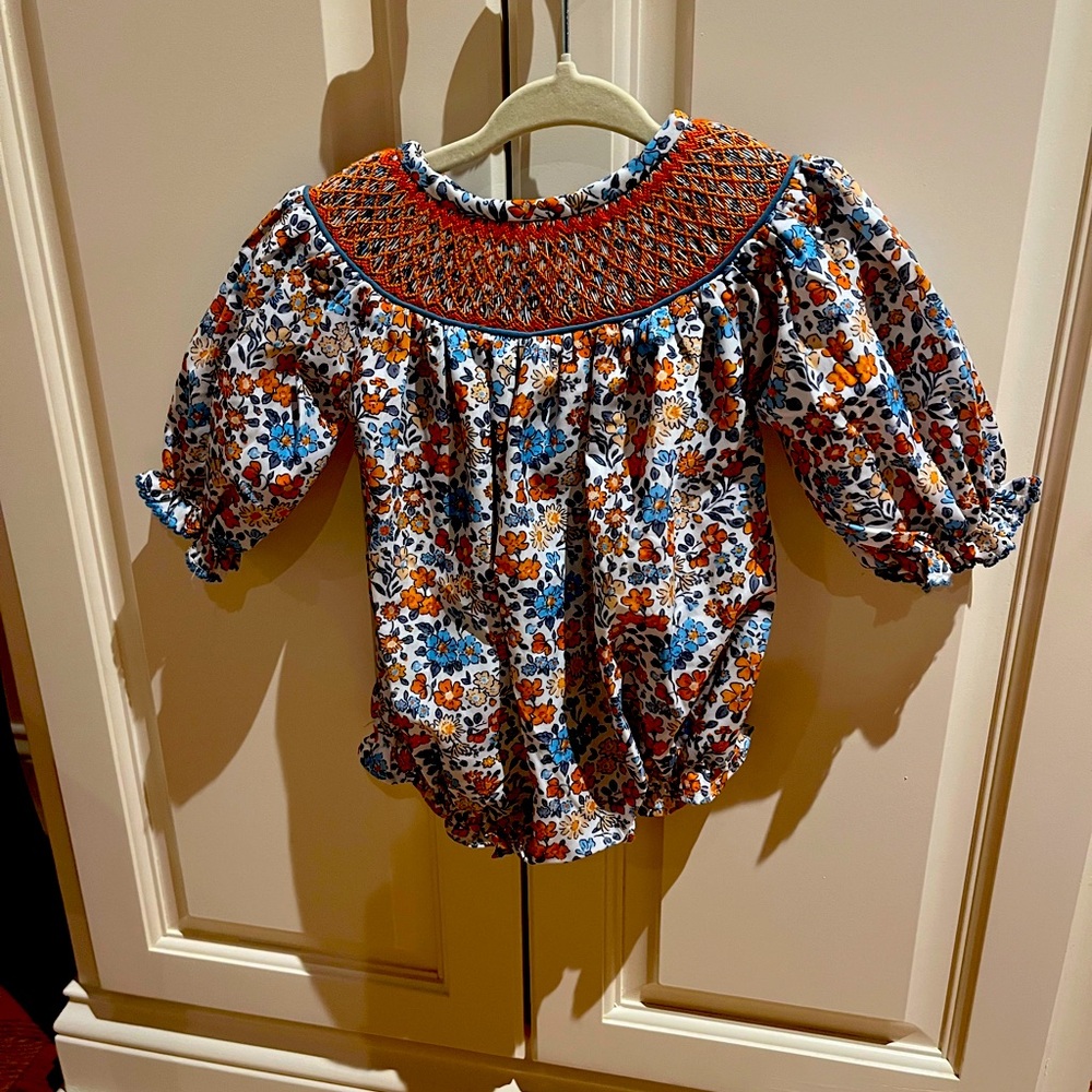 $42 Smocked Flamingo. NEW with tags. Newborn long sleeve bubble